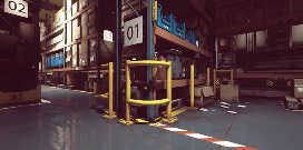 Yellow wrap-around guards protect a shelf full of product in a warehouse facility